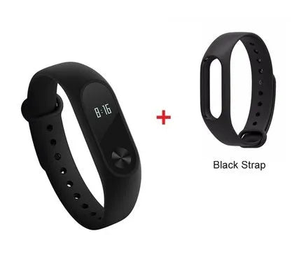 Xiaomi Mi Band 2 black smartband on wrist showing OLED display with heart rate and step count.