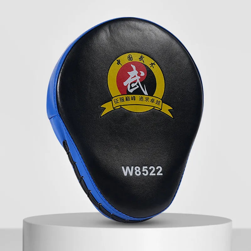 A pair of PU punch mitts for boxing and Muay Thai training, shown in a red edge and black surface colour variant.