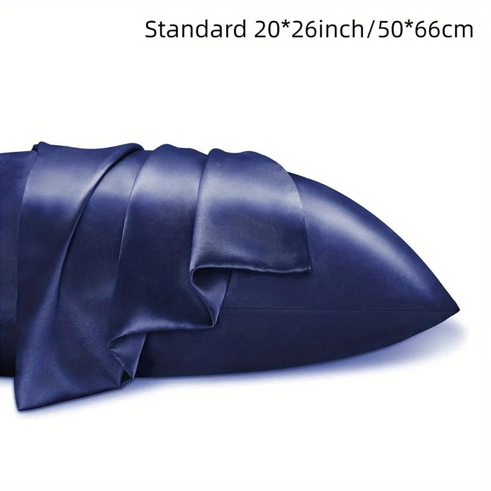 Pair of solid colour satin cloth pillowcases in polyester fibre available in twelve colours and four sizes