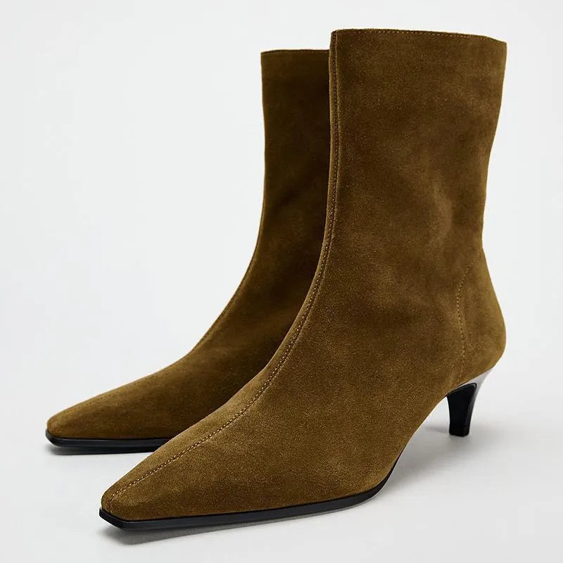 Brown square toe women's ankle boots with a side zip and a mid kitten heel on a waterproof platform sole.