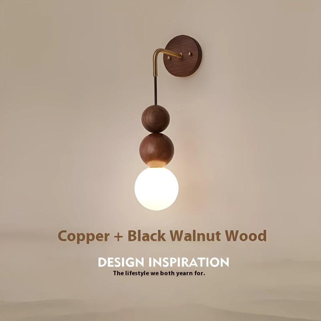 Walnut and copper suspension wall lamp with tri-colour light on a wall