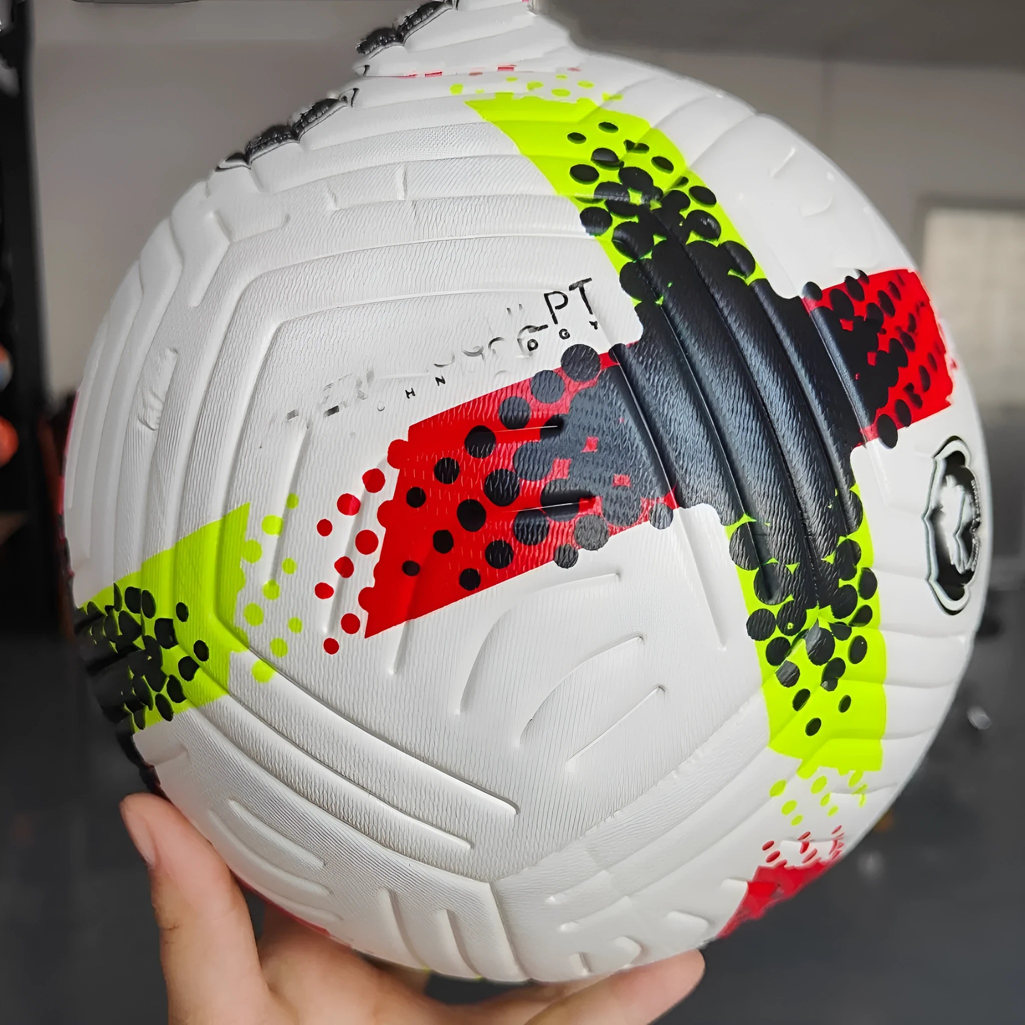 Fluorescent green Size 5 football with PU leather construction for training and matches