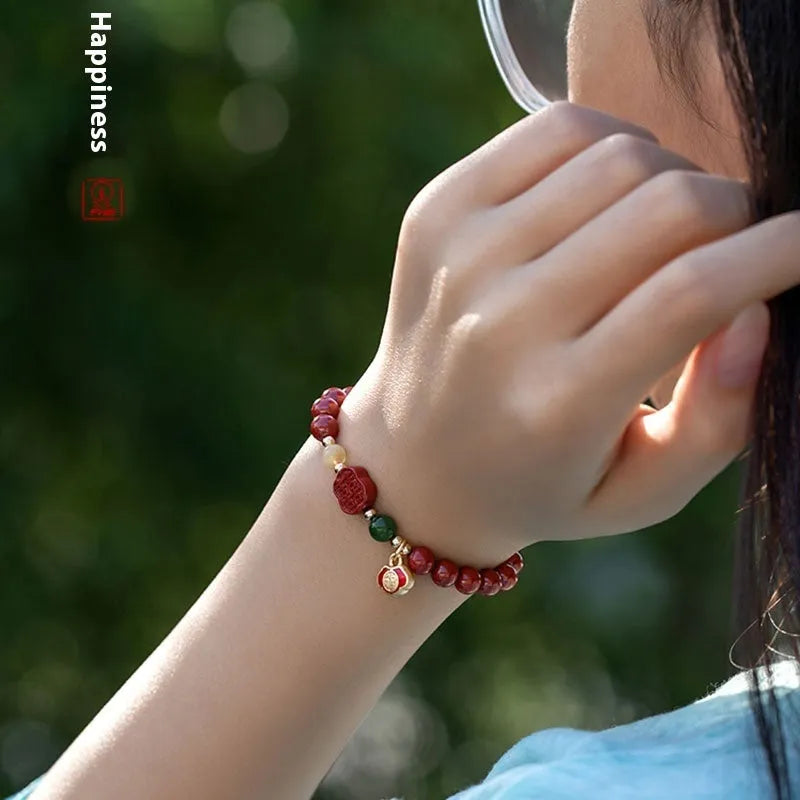 Cinnabar fu character bracelet with emperor sandstone beads in 6mm and 8mm size options.