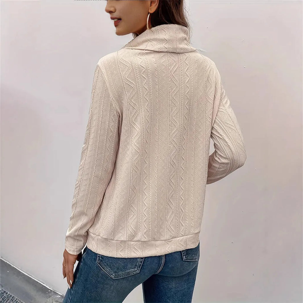 Apricot coloured long sleeve hooded pullover sweater with drawstring closure