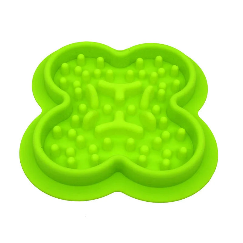 Blue silicone pet licking mat with textured grooves and a non-slip base for cats and dogs.