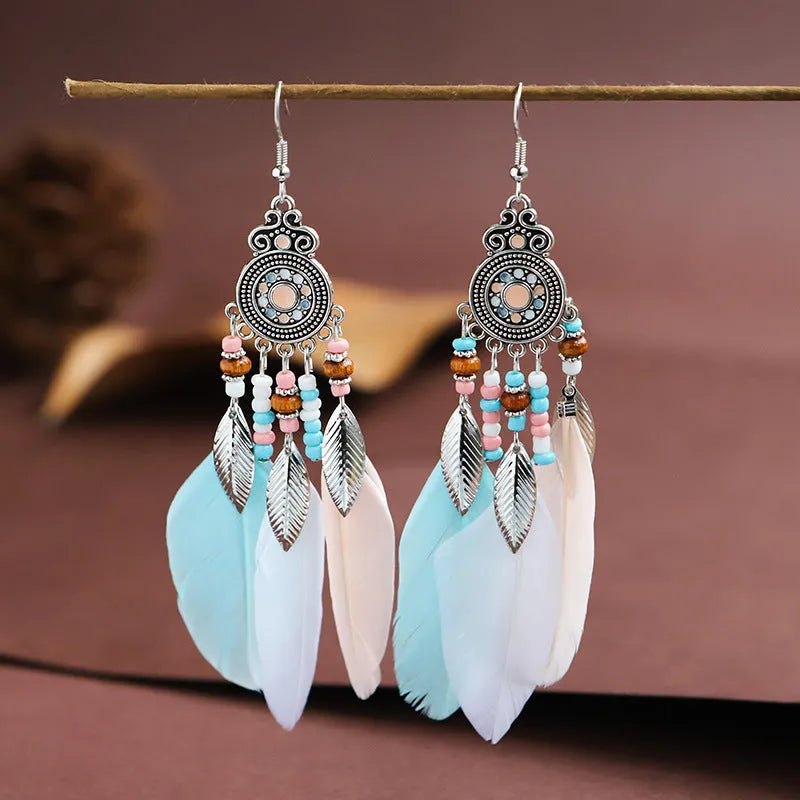 Feather pattern drop earrings with round oil craft design in alloy with electroplated finish