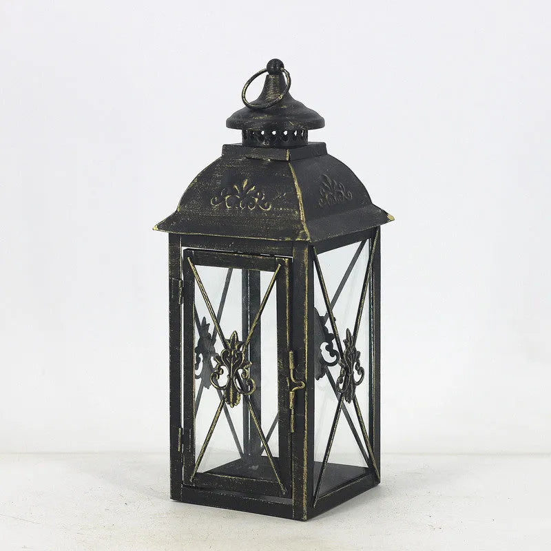 European black and white wrought iron floor-standing storm lantern with tempered glass in three sizes for courtyard decoration.