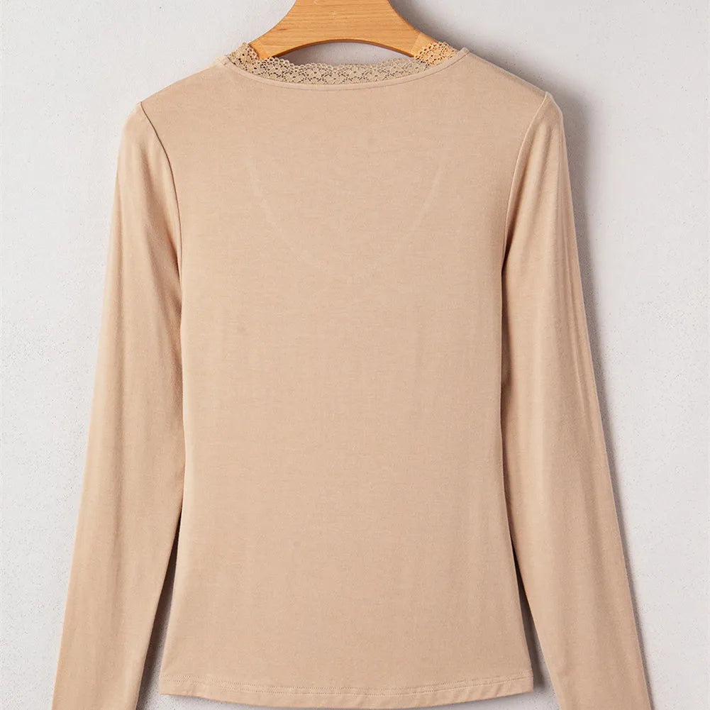 Women's red slim fit long sleeve casual top with delicate lace trim detail on the sleeves.