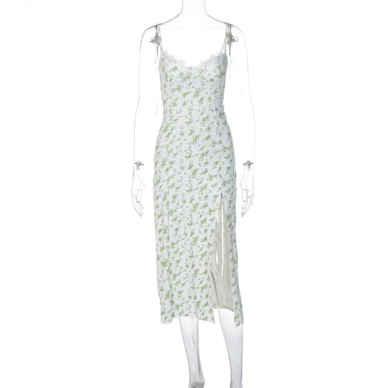Women's long dress with lace flowers print, slit detail, and suspender straps in solid colour