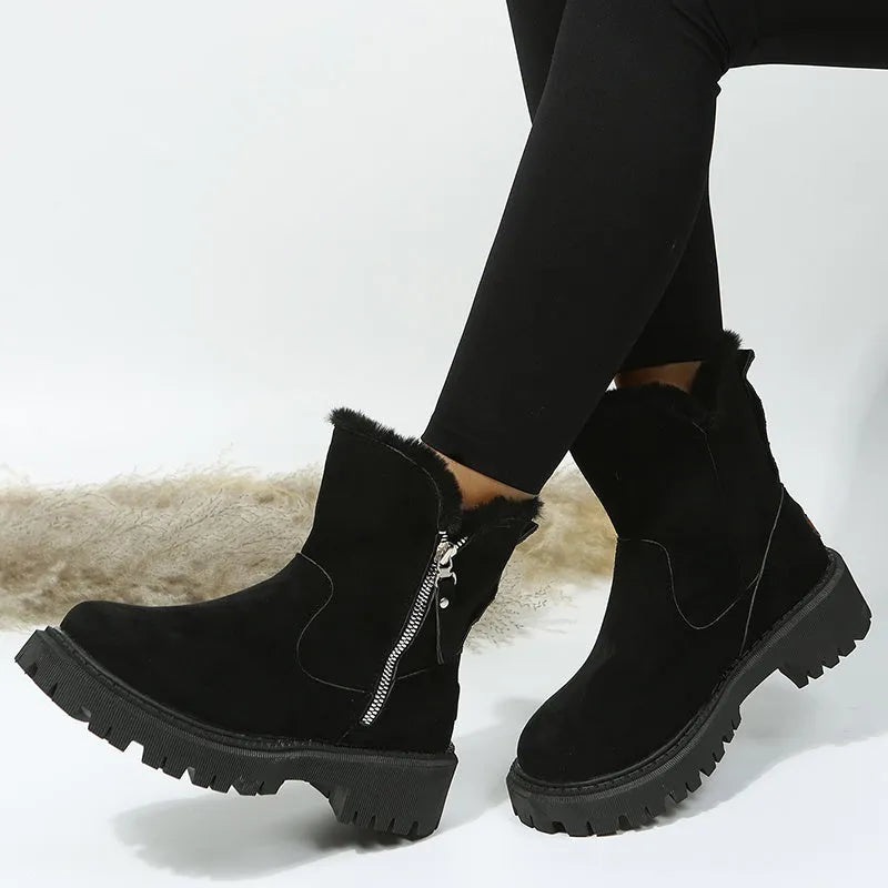 Black women's high-top snow boots with side zipper, faux suede upper, and non-slip rubber sole.