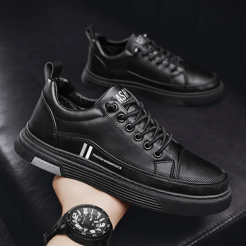 Men's low-top skate shoes in black with elastic band fastening and round toe.
