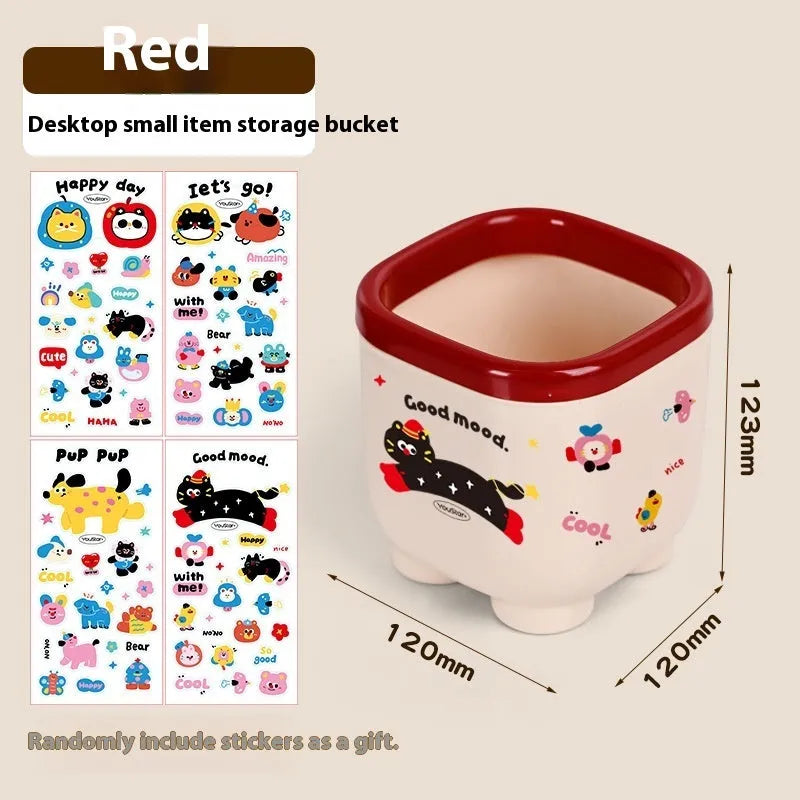 Red and brown cartoon-style desktop storage organiser with grid pattern and sticker set for labelling.