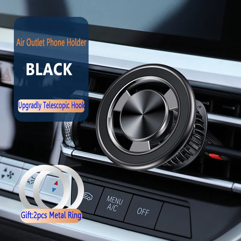 Silver and black magnetic car phone holder mounted on a vehicle air vent