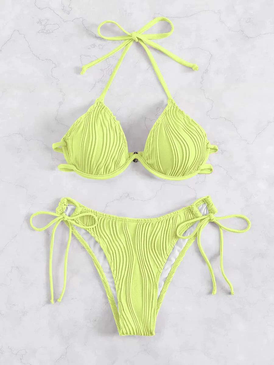 Women's apricot coloured bikini swimsuit with underwire support on a mannequin.