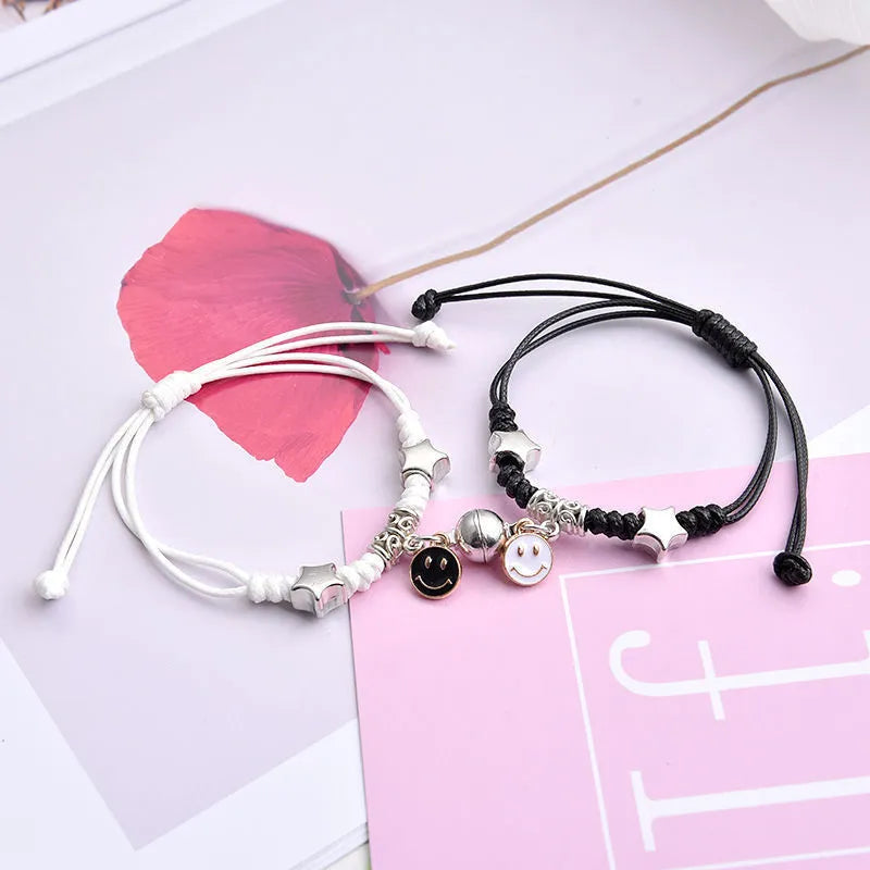 Magnetic couple bracelets with crown and diamond designs in alloy electroplated construction