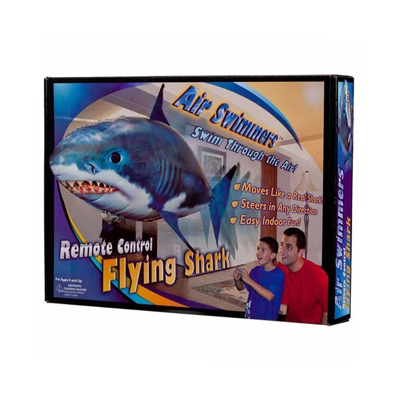 Large remote control Shark inflatable balloon toy flying indoors with side-swaying tail.