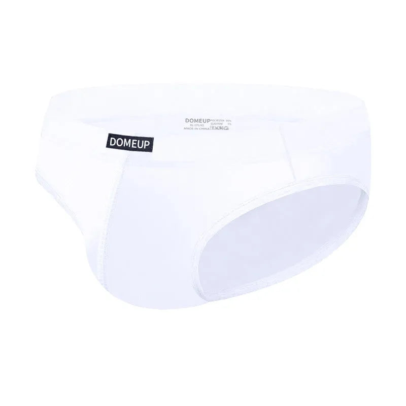 Men's solid colour low-waist briefs in seamless breathable polyester fabric