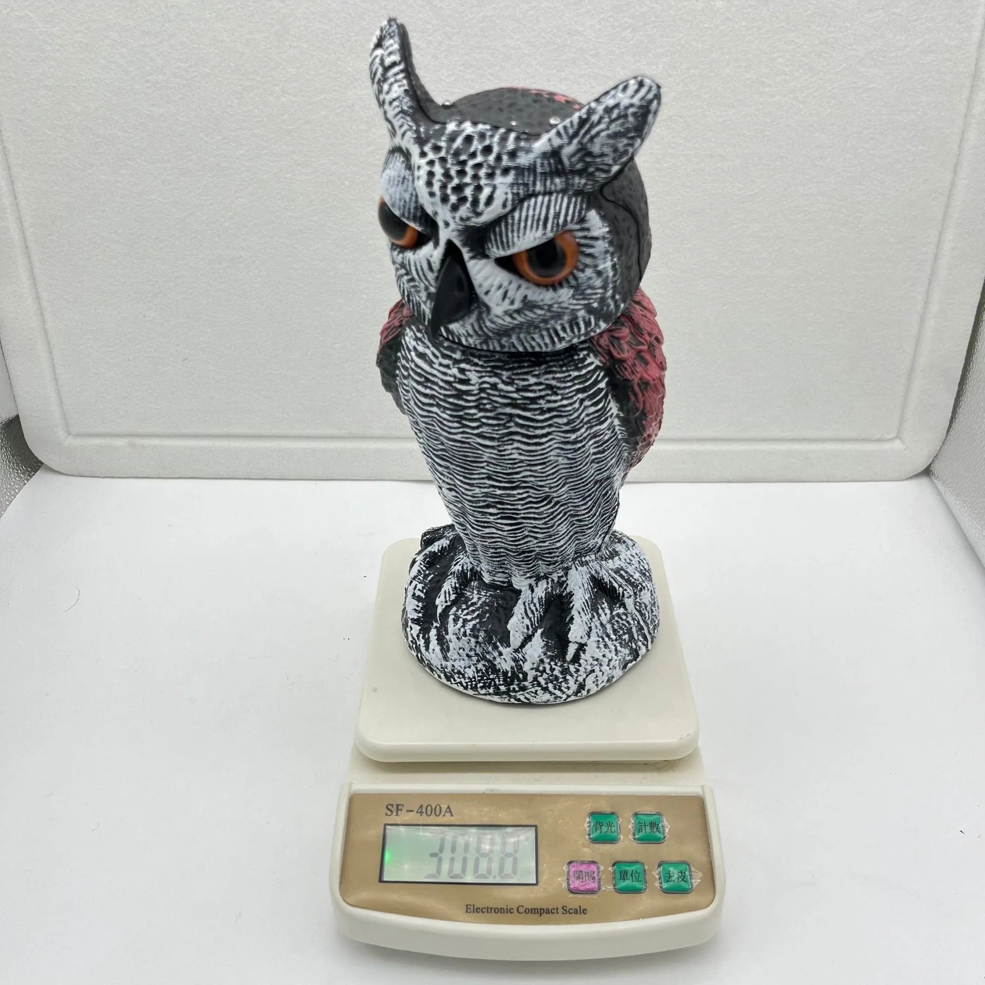 Artificial owl bird scarer ornament with motion features for outdoor garden pest control
