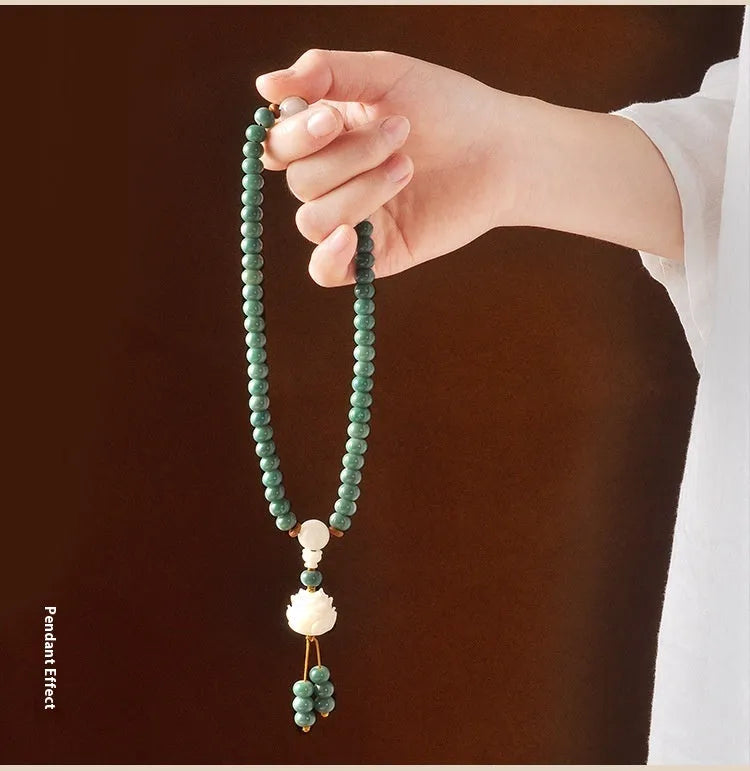 White jade bodhi seed bracelet with green sandalwood tones and double ring safety buckle clasp