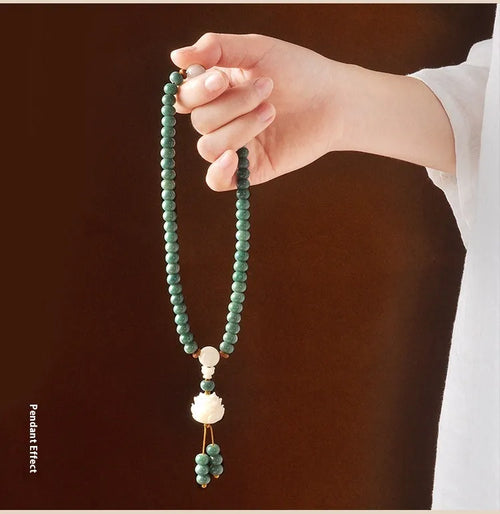 White jade bodhi seed bracelet with green sandalwood tones and double ring safety buckle clasp
