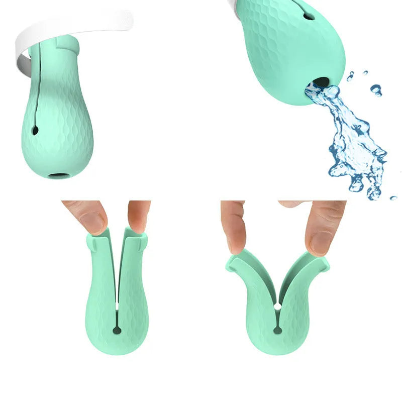 Green silicone cat anti-scratch gloves covering hands and lower arms for pet protection
