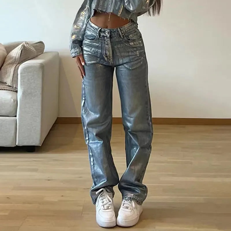 High waist straight leg blue jeans with hot silver contrast details on a model, showing the street hipster style.