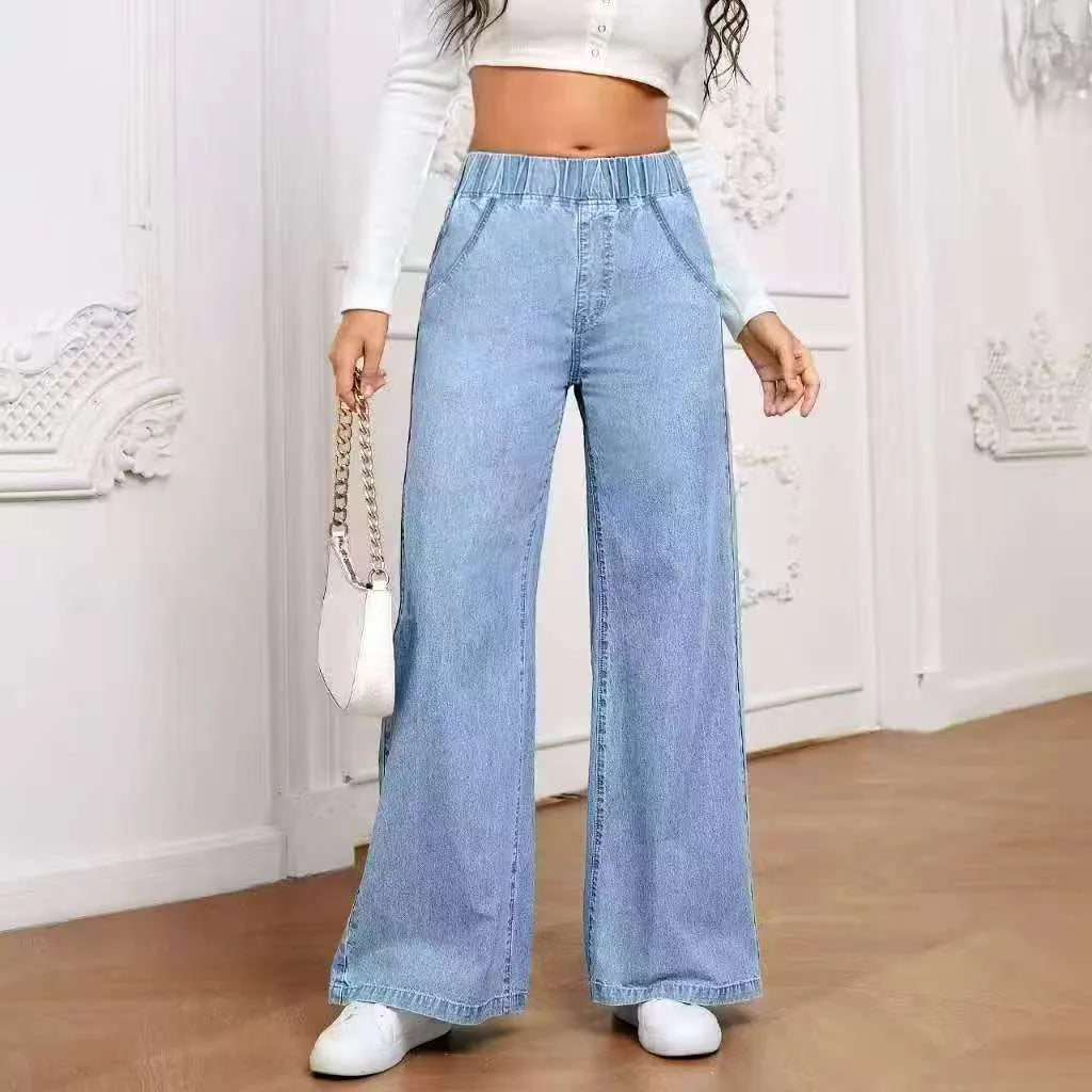 Plus size light blue washed denim jeans with wide leg straight cut and zip fly