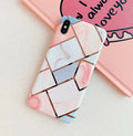 Silicone gel mobile phone protective case for Apple iPhone models on a table