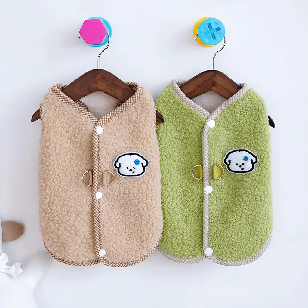 Green coral fleece dog vest with a D-ring leash attachment on a small dog.