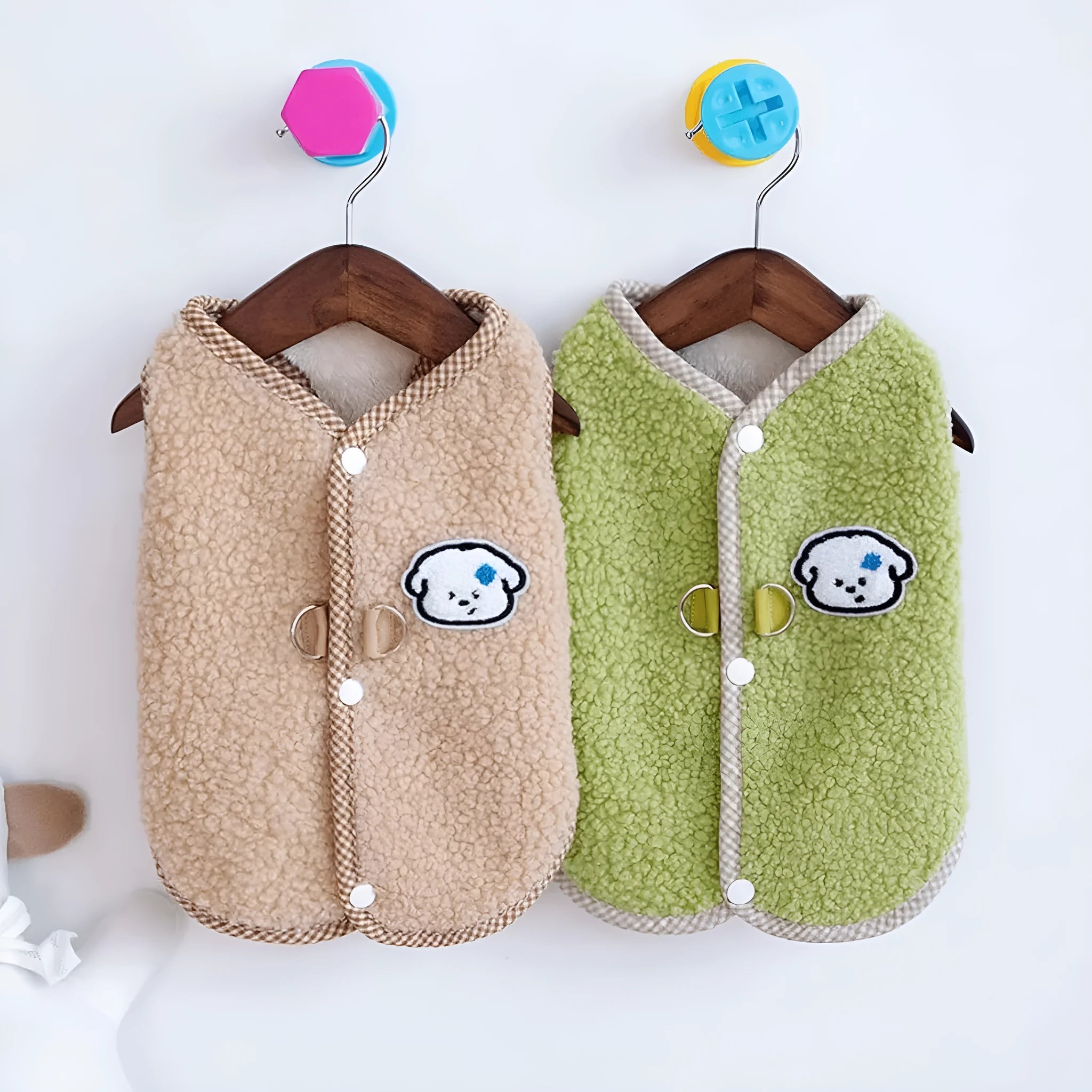 Green coral fleece dog vest with a D-ring leash attachment on a small dog.