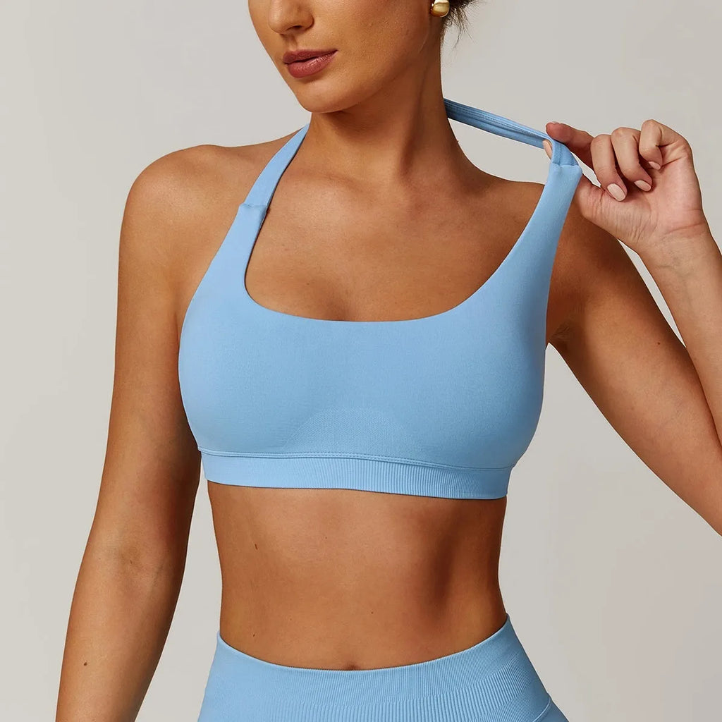 Women's halter style yoga sports bra in nylon with removable chest pads