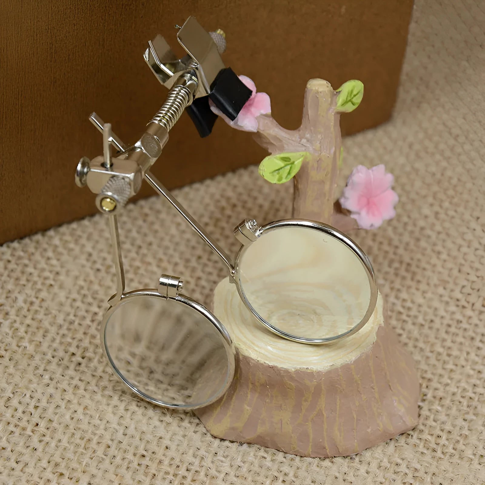 Auxiliary reading glass double clip with metal bracket and glass lenses for clip-on magnification.