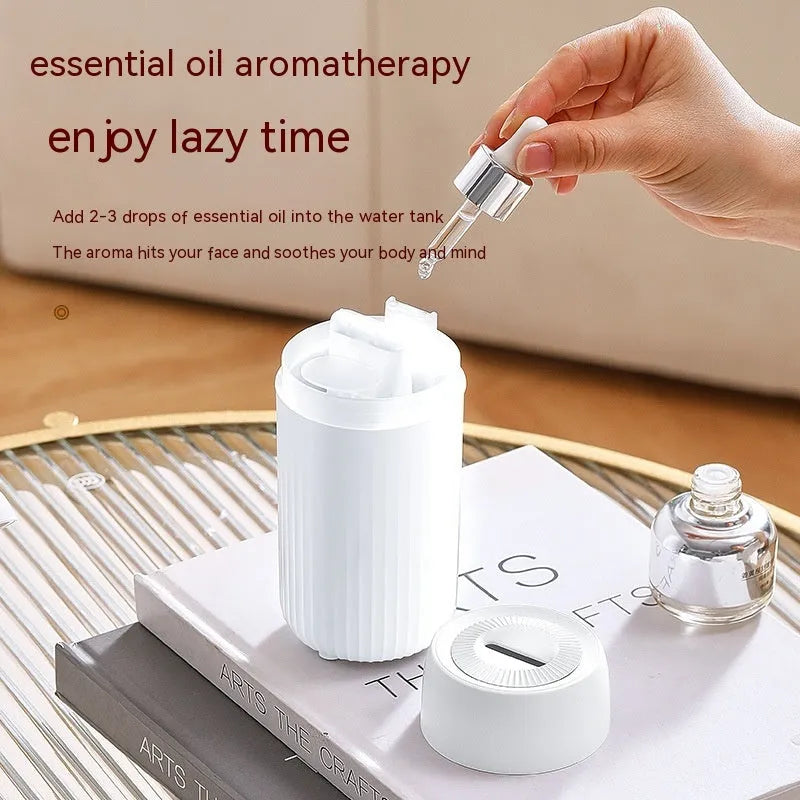 Black or white car flame aroma diffuser automatic sprayer measuring 70x70x143mm