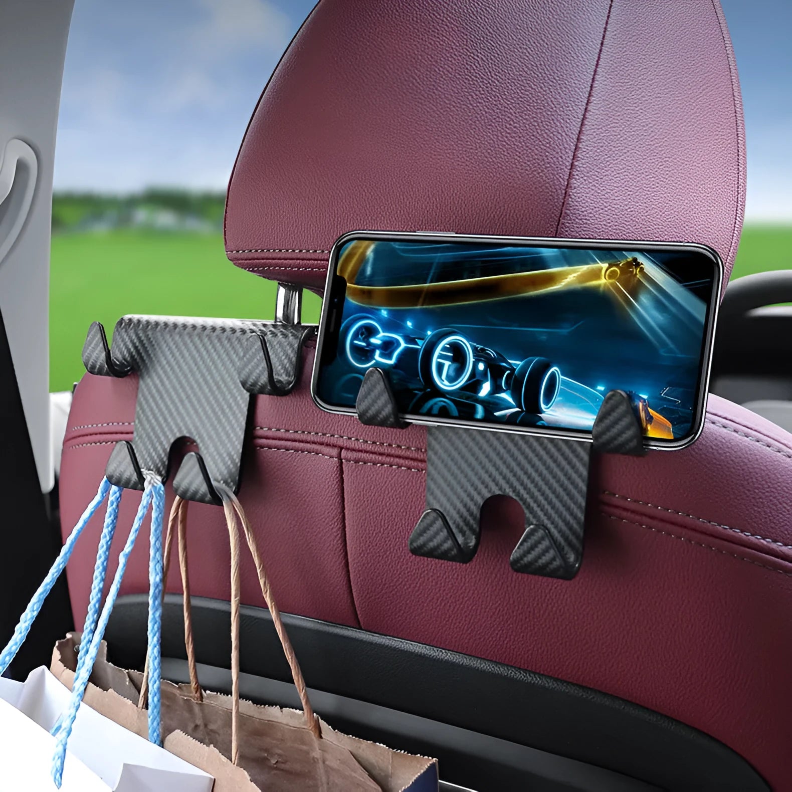 Black ABS plastic car hook and mobile phone bracket organiser for rear seat storage.