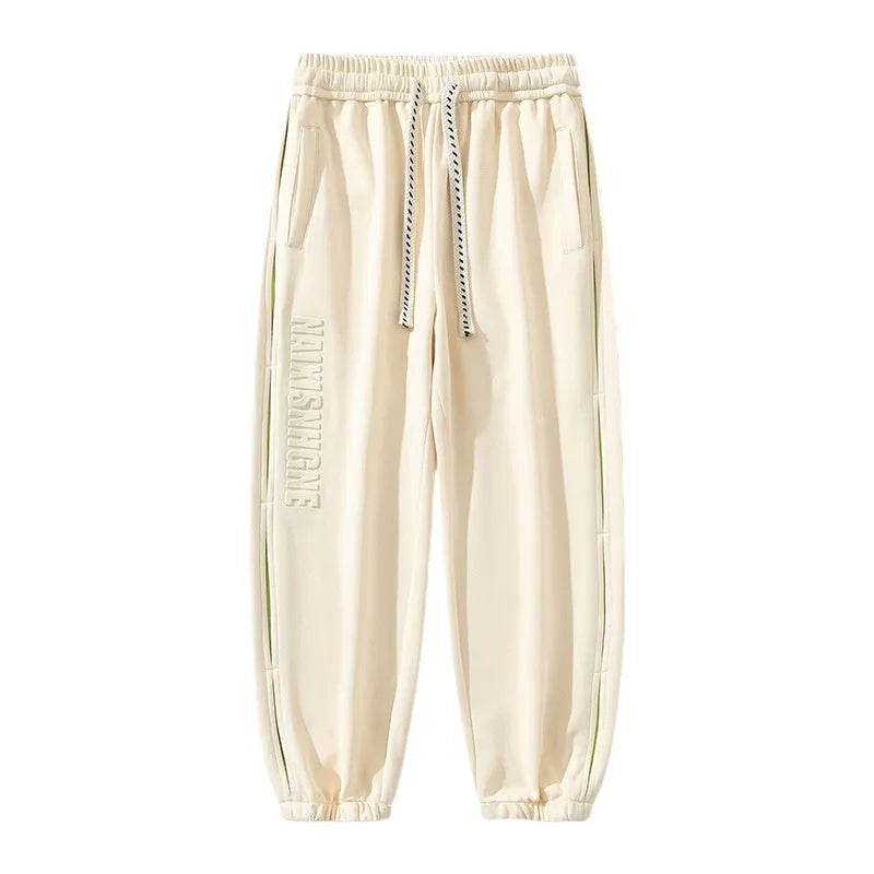 Men's loose fit trousers with stitching printing detail and banded ankle cuffs in micro elastic cotton fabric