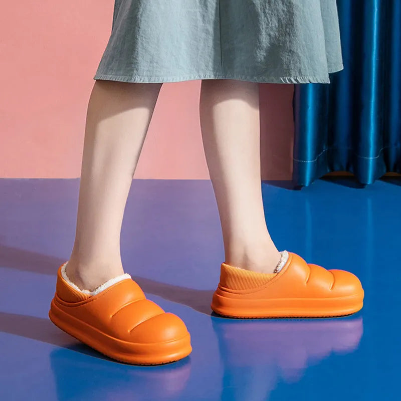 Waterproof couple cotton slippers in EVA material with non-slip sole and plush lining
