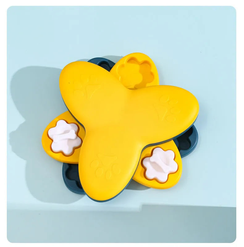 Green and yellow dog puzzle toy with nine bone-shaped covers on a non-slip base.