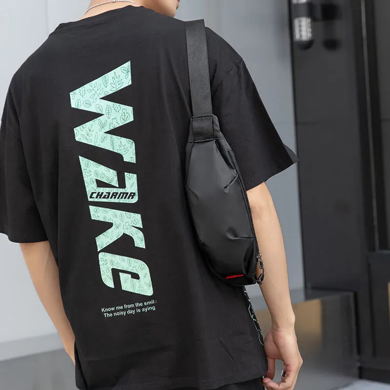 Black Oxford cloth crossbody waist pack with multiple internal pockets showing dimensions
