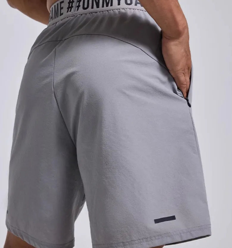 Men's black loose sports shorts with elastic waistband for workout and running