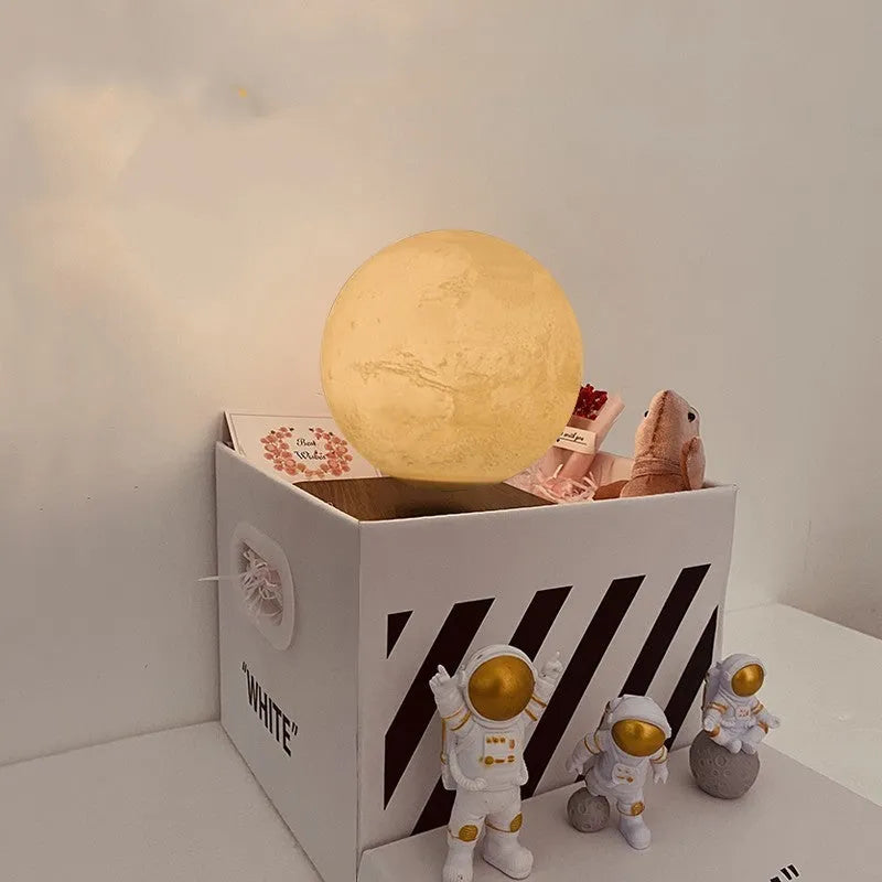 Maglev levitating planet night light floating above base with astronaut figurines