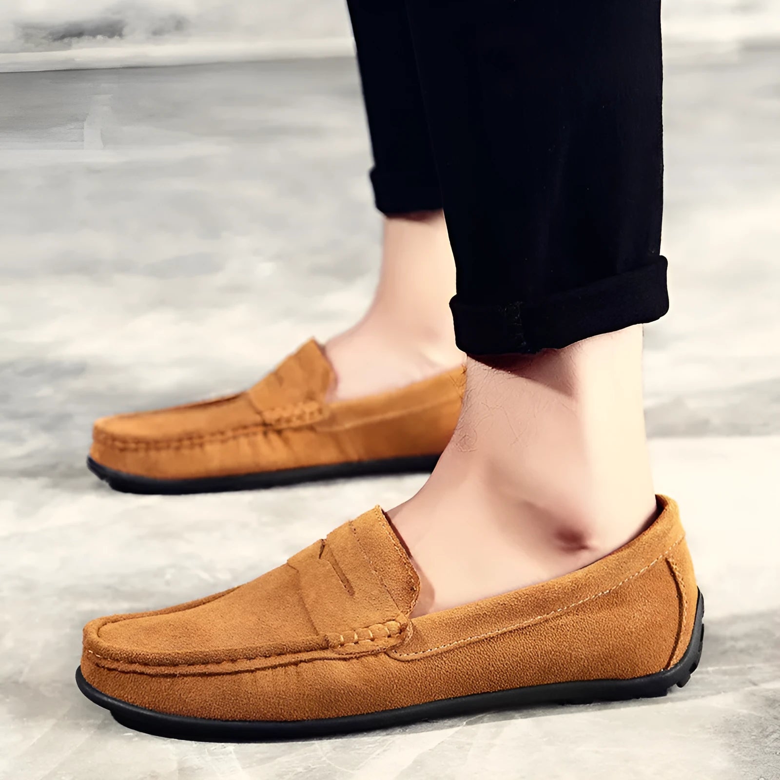 Men's brown suede casual loafers with a round toe and flat rubber sole on a white background.