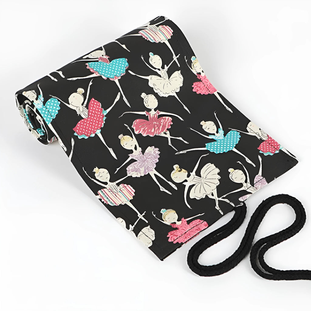 Square canvas rolling pencil case with ballet girl print, showing multiple pencil slots inside.