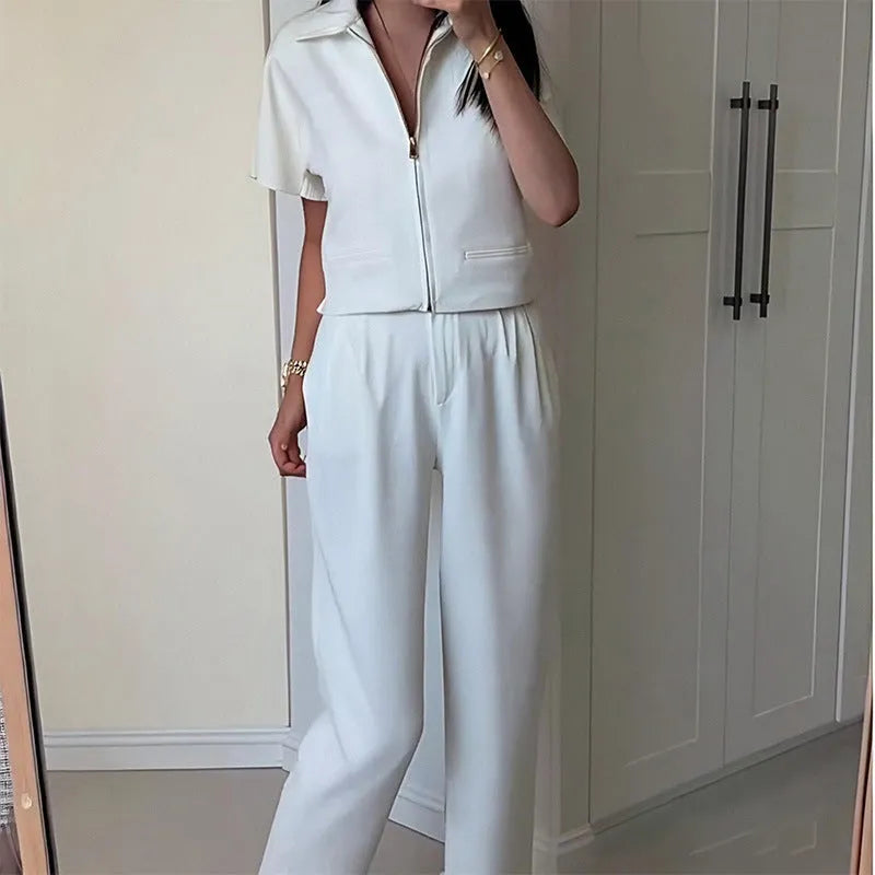 Loose fit casual polyester top in black, white or yellow with short sleeves
