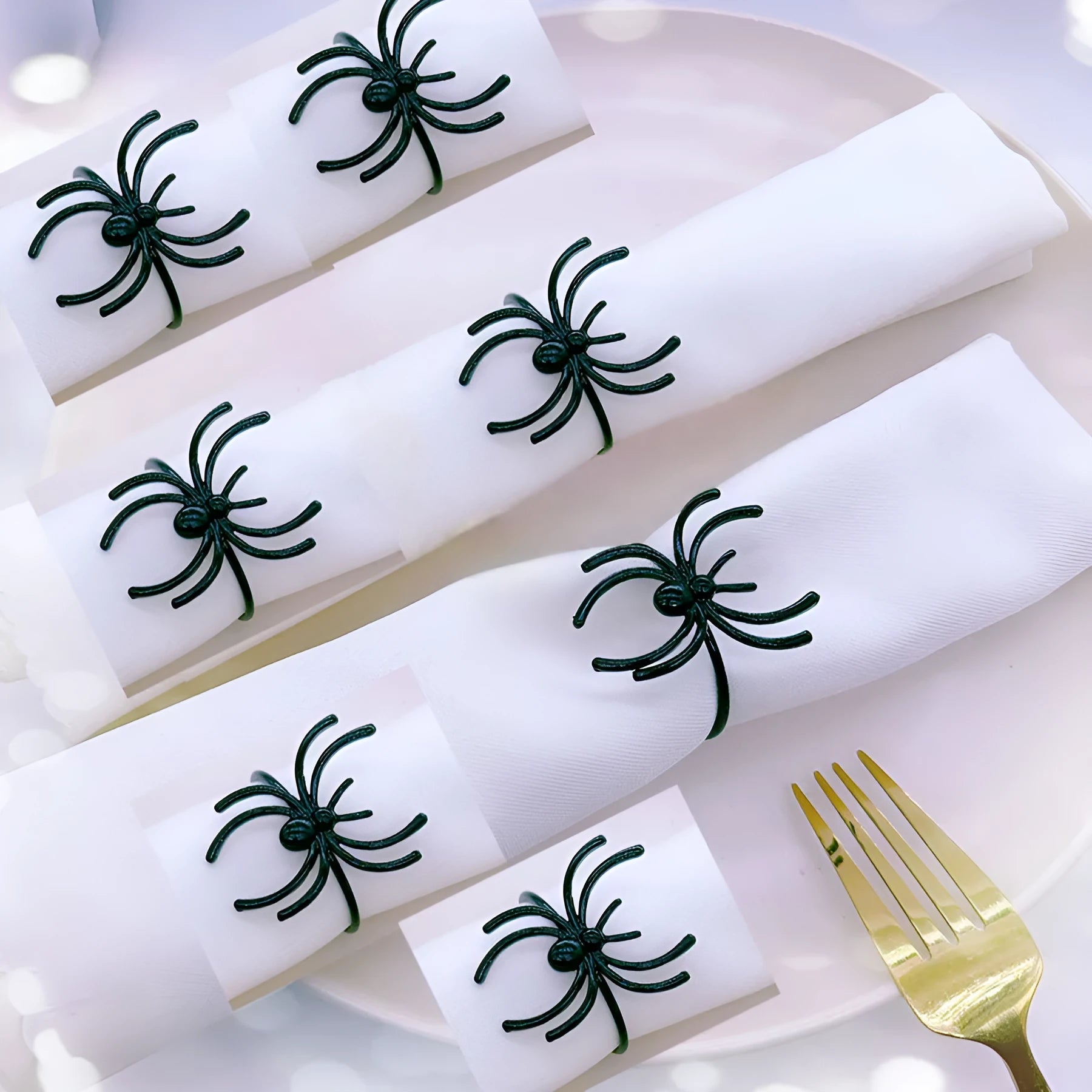 Six black spider design alloy napkin rings for Halloween table decoration measuring 5x4.5x4cm