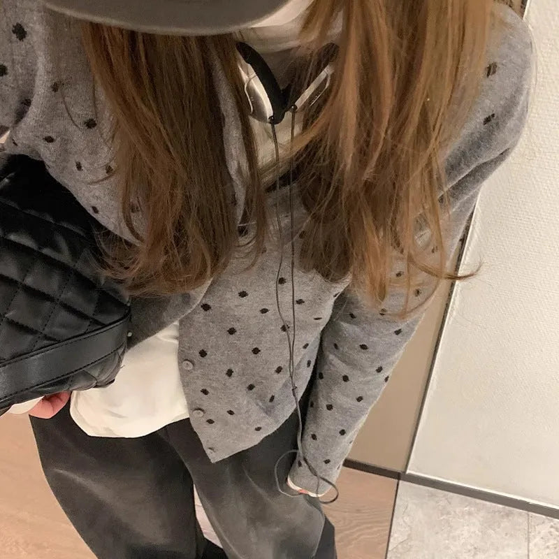 Women's Korean-inspired grey dot pattern knitted cardigan with crocheted flower details and long sleeves