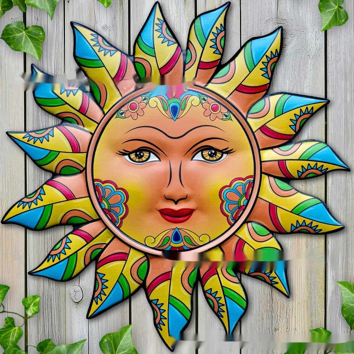Iron sun face metal wall hanging decoration on a plain background