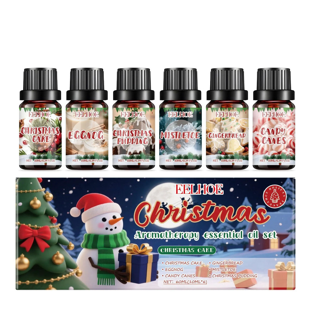 Christmas aromatherapy oil set showing 60ml bottle and six 10ml mini bottles with reed diffuser sticks