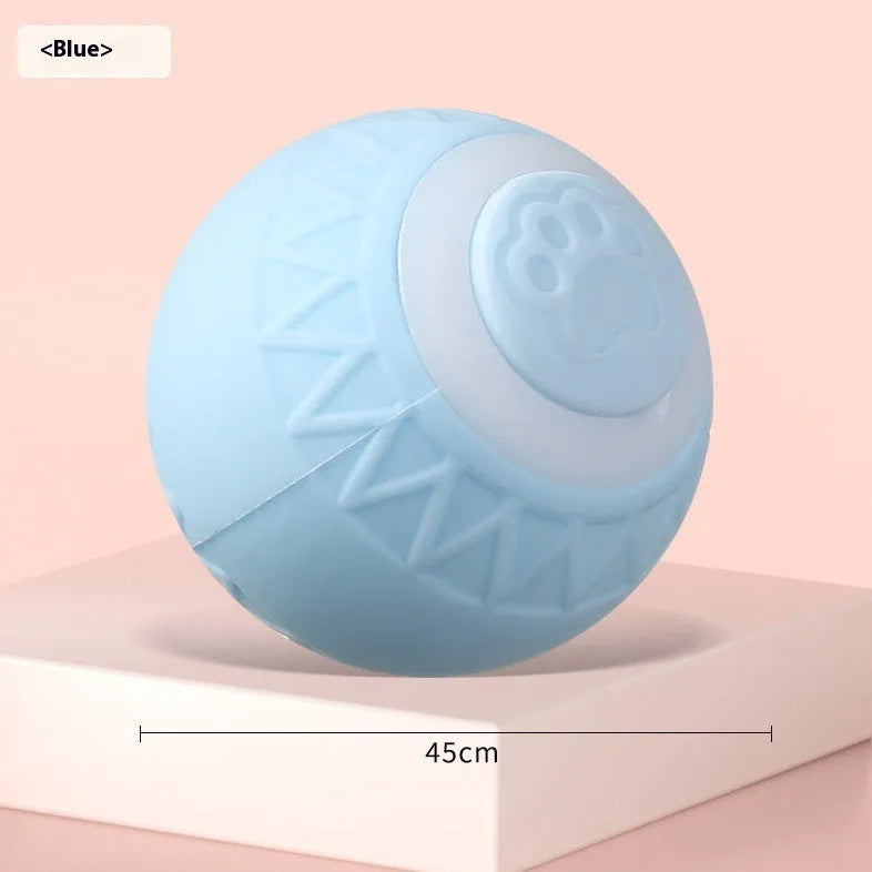 Blue automatic moving cat toy ball on floor with charging cable
