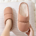Down cotton slippers with thick rubber soles and artificial leather uppers in multiple colours