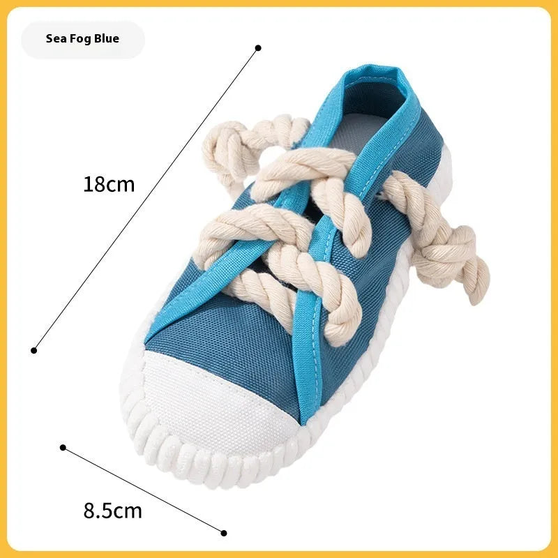 Dog sound slippers toy in plastic with squeaker for chewing relief